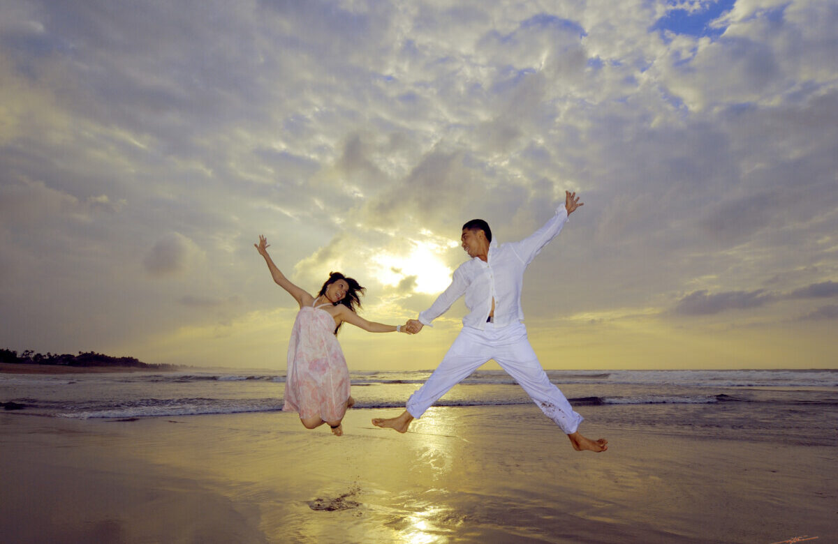 Puerto Vallarta destination wedding ceremony at sunset overlooking the ocean