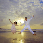 Puerto Vallarta destination wedding ceremony at sunset overlooking the ocean